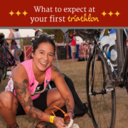 Female triathlete sets up her area in transition before a triathlon. Text on design reads What to Expect at Your First Triathlon. Learn more at https://captextri.com/your-first-triathlon/